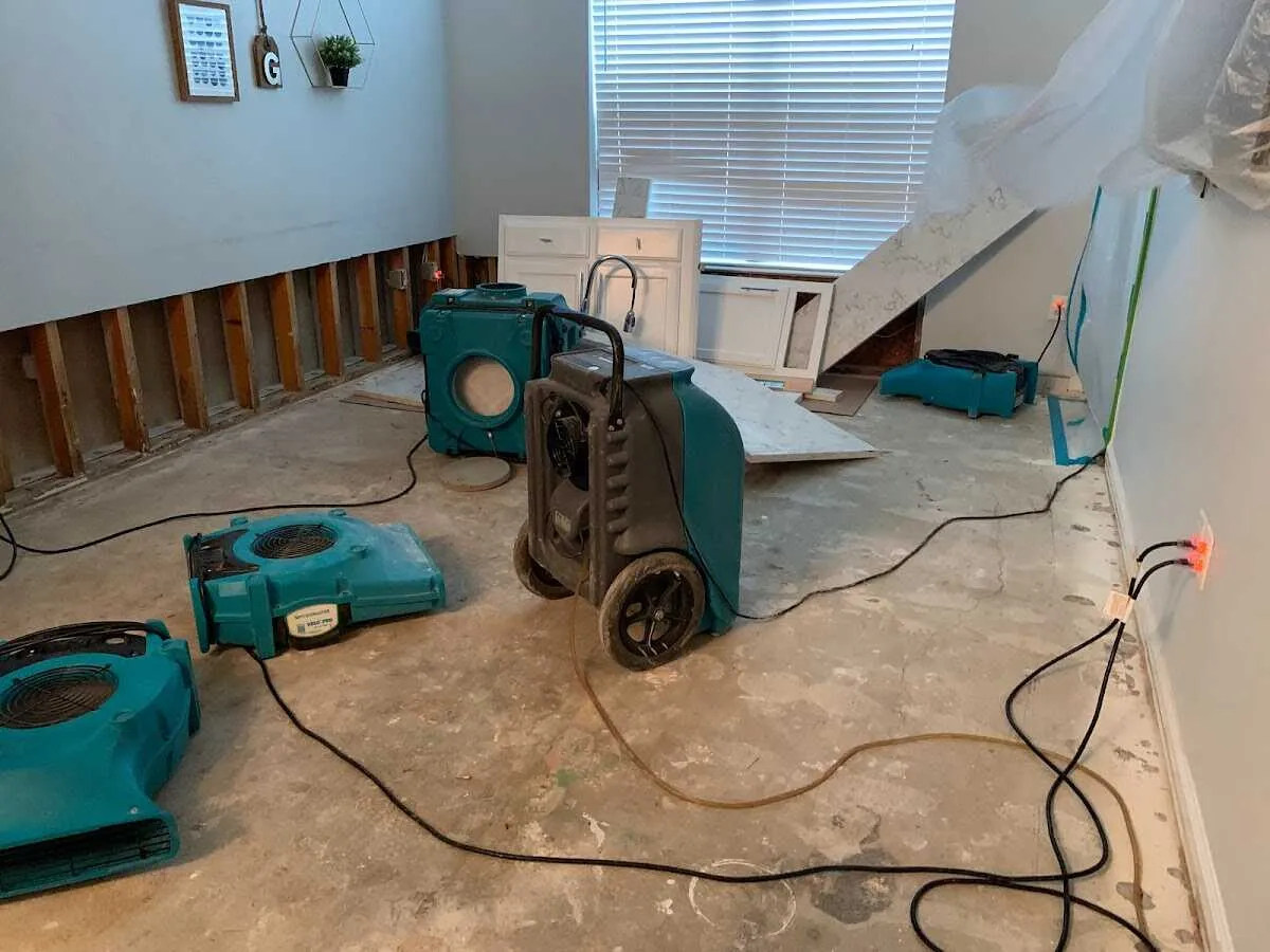 Dehumidifier in flood-cut room for Water Damage Restoration in University of Virginia